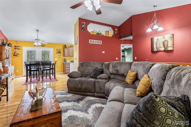 8007 Engleford Rd, Dittmer, MO 63023 - living area with a ceiling fan, lofted ceiling, wood finished floors, and baseboards
