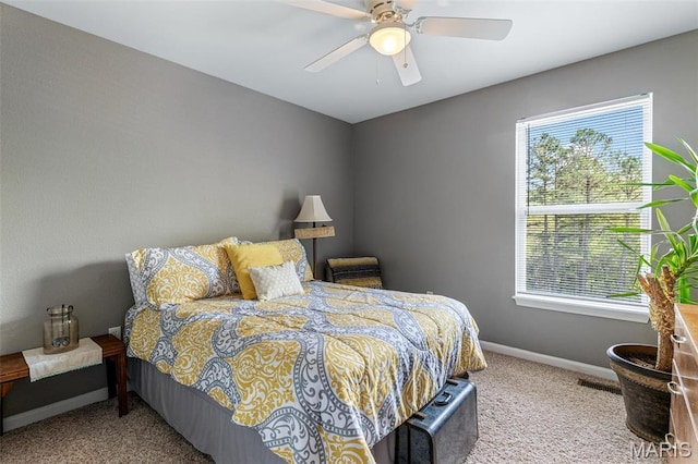 8007 Engleford Rd, Dittmer, MO 63023 - bedroom with carpet flooring, multiple windows, baseboards, and ceiling fan