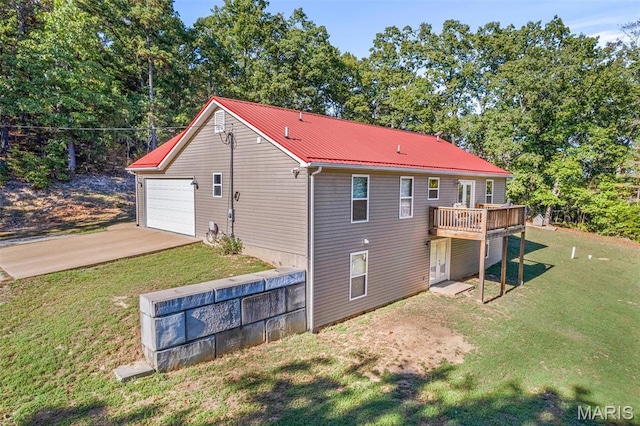 8007 Engleford Rd, Dittmer, MO 63023 - view of property exterior with driveway, a lawn, metal roof, a deck, and a garage