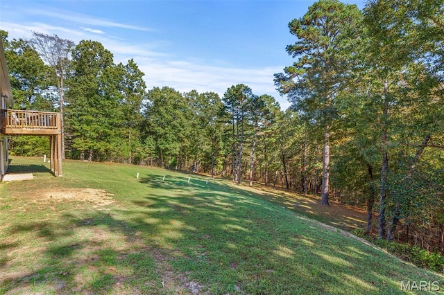 8007 Engleford Rd, Dittmer, MO 63023 - view of grassy yard with a wooden deck and a view of trees
