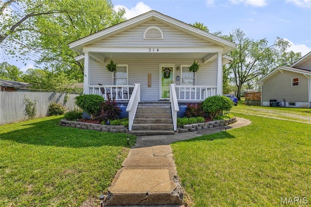 314 S Carleton St, Farmington, MO 63640 - shotgun-style home with a porch