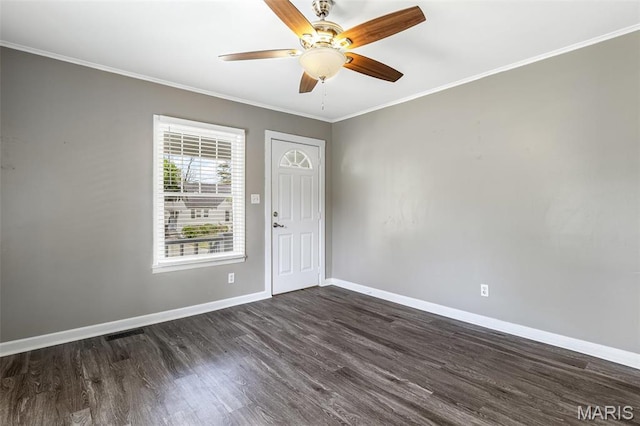 314 S Carleton St, Farmington, MO 63640 - spare room with baseboards, dark wood-type flooring, a ceiling fan, and ornamental molding