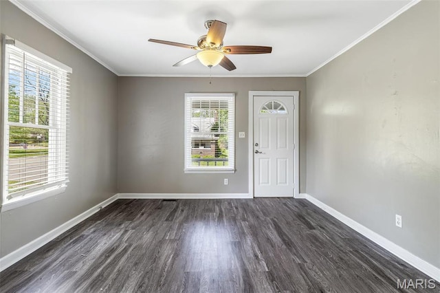 314 S Carleton St, Farmington, MO 63640 - unfurnished room featuring ornamental molding, baseboards, a ceiling fan, and dark wood-style floors