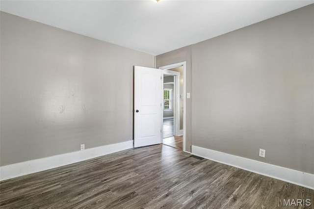 314 S Carleton St, Farmington, MO 63640 - unfurnished room featuring dark wood finished floors and baseboards