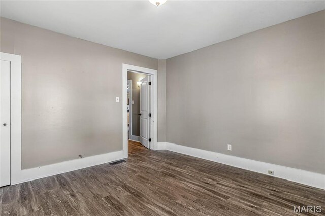 314 S Carleton St, Farmington, MO 63640 - unfurnished room featuring dark wood finished floors and baseboards