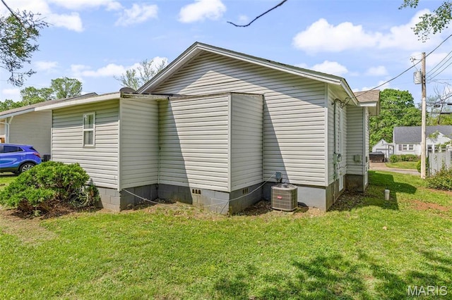 314 S Carleton St, Farmington, MO 63640 - view of home's exterior with crawl space, a lawn, and central air condition unit