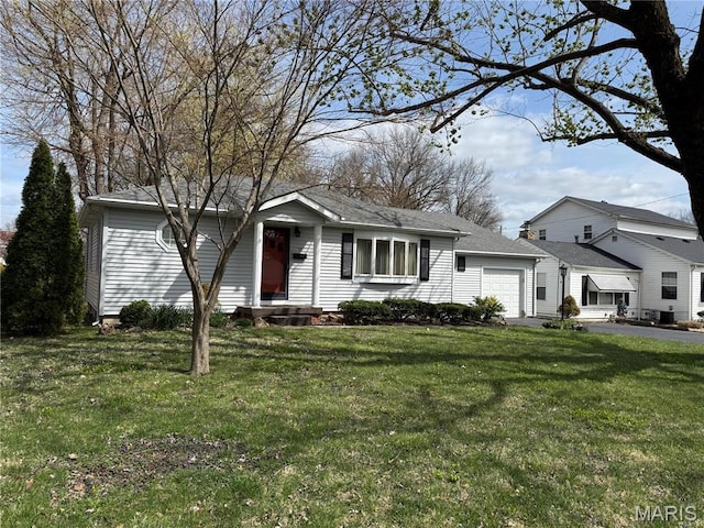 1808 N 15th St, Swansea, IL 62226 - view of front of property with a garage, a front lawn, asphalt driveway, and a shingled roof
