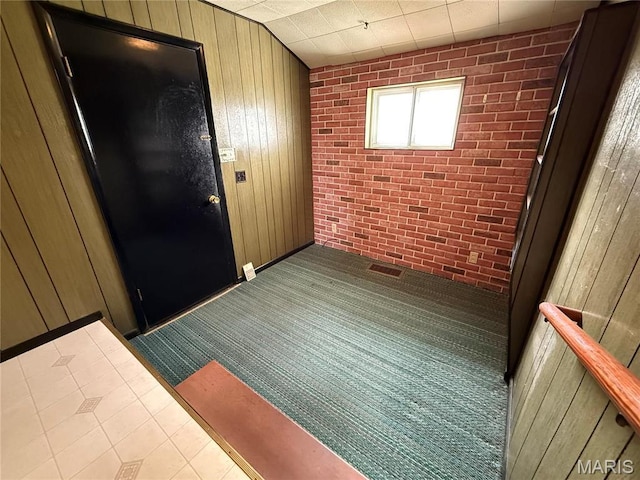 1808 N 15th St, Swansea, IL 62226 - empty room featuring wooden walls and brick wall