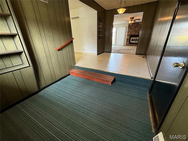 1808 N 15th St, Swansea, IL 62226 - hallway featuring wood walls and carpet flooring