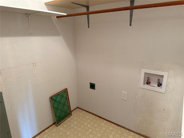 1808 N 15th St, Swansea, IL 62226 - laundry room with hookup for an electric dryer, light floors, hookup for a washing machine, and baseboards