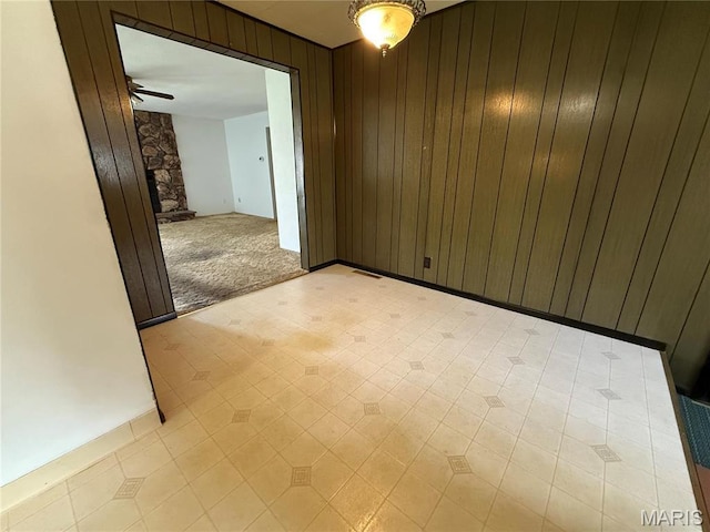 1808 N 15th St, Swansea, IL 62226 - empty room featuring wooden walls and a ceiling fan