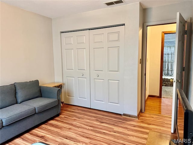 1725 Spruce Hill Dr, Belleville, IL 62221 - living area with light wood-type flooring and baseboards