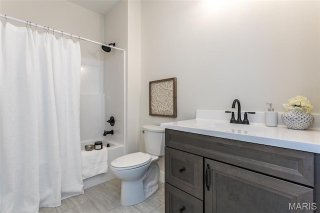 bathroom featuring toilet, vanity, shower / bath combination with curtain, and tile patterned flooring