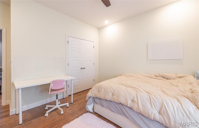 1347 Thomas Dr, Rolla, MO 65401 - bedroom with wood finished floors, recessed lighting, baseboards, and ceiling fan