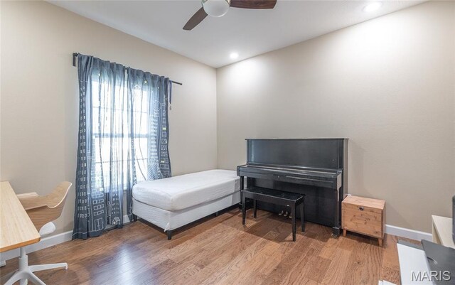 1347 Thomas Dr, Rolla, MO 65401 - bedroom featuring wood finished floors, baseboards, ceiling fan, and recessed lighting