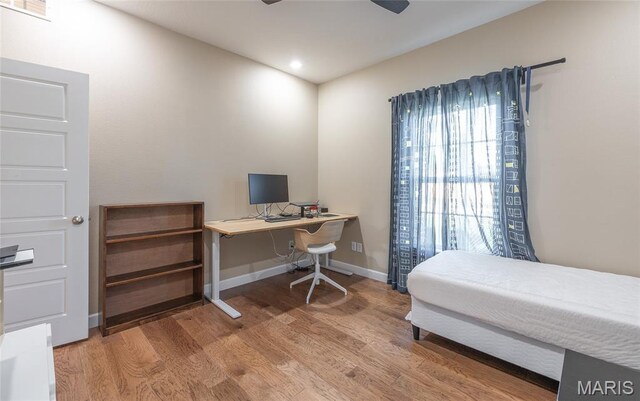 1347 Thomas Dr, Rolla, MO 65401 - bedroom featuring wood finished floors, baseboards, a desk, and recessed lighting