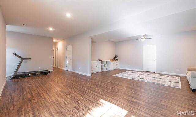 1347 Thomas Dr, Rolla, MO 65401 - unfurnished living room with wood finished floors, a ceiling fan, baseboards, and recessed lighting