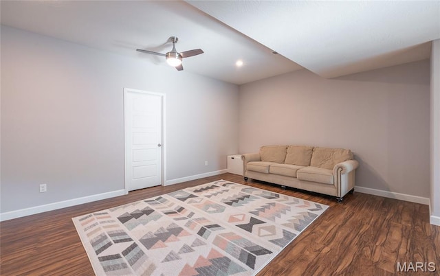 1347 Thomas Dr, Rolla, MO 65401 - living room featuring baseboards, dark wood-style flooring, and ceiling fan