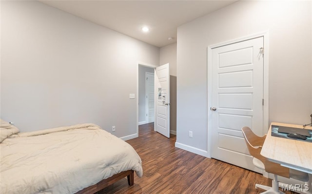 1347 Thomas Dr, Rolla, MO 65401 - bedroom featuring wood finished floors, baseboards, and recessed lighting