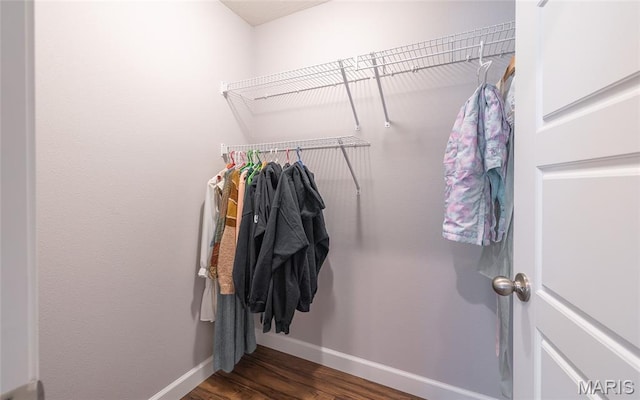 1347 Thomas Dr, Rolla, MO 65401 - walk in closet featuring wood finished floors