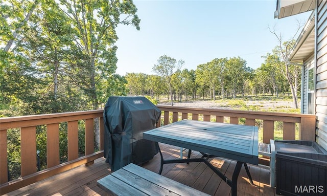 1347 Thomas Dr, Rolla, MO 65401 - wooden terrace with a grill and outdoor dining space
