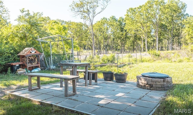 1347 Thomas Dr, Rolla, MO 65401 - view of patio / terrace featuring a fire pit