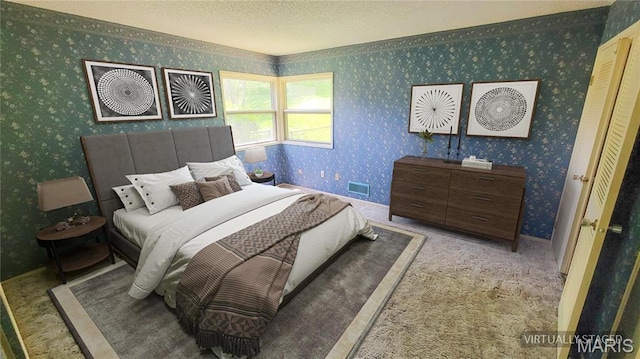 5489 Limerick Dr, Saint Louis, MO 63128 - carpeted bedroom featuring wallpapered walls and a textured ceiling
