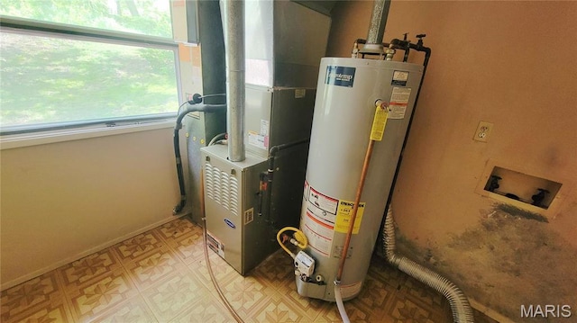 5489 Limerick Dr, Saint Louis, MO 63128 - utilities with water heater and heating unit