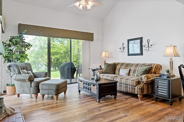 45 S Lionshead Dr, Innsbrook, MO 63390 - living room with ceiling fan, high vaulted ceiling, and wood finished floors