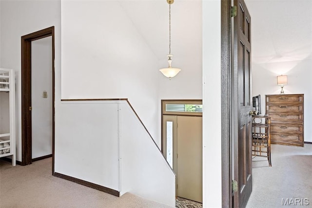 45 S Lionshead Dr, Innsbrook, MO 63390 - carpeted entryway with high vaulted ceiling and baseboards