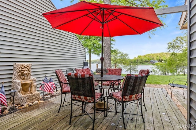 45 S Lionshead Dr, Innsbrook, MO 63390 - wooden terrace with outdoor dining space