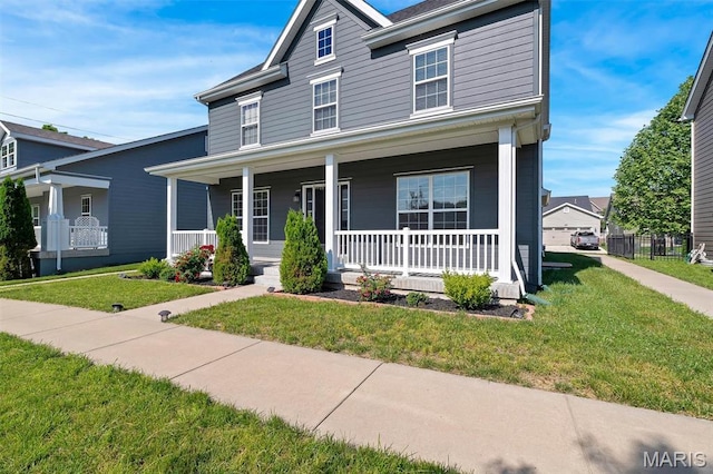 153 Stella Cherry Way, Wildwood, MO 63040 - view of front of home with covered porch and a front lawn