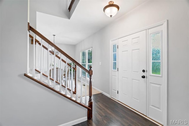 153 Stella Cherry Way, Wildwood, MO 63040 - entryway featuring dark wood-style floors, stairway, and baseboards