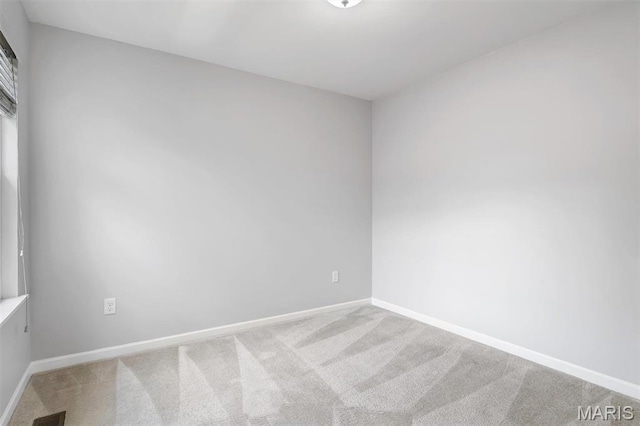 153 Stella Cherry Way, Wildwood, MO 63040 - empty room with carpet floors and baseboards