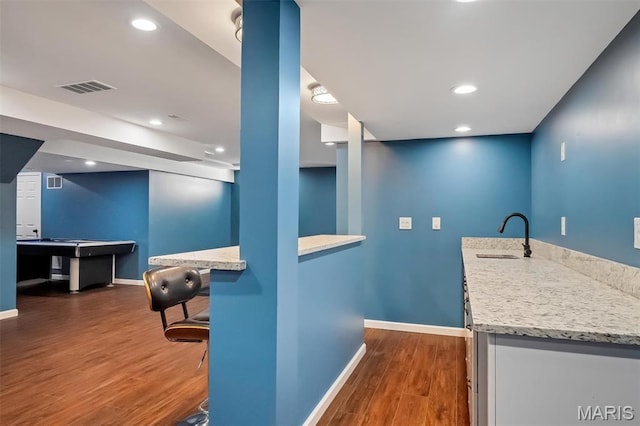 153 Stella Cherry Way, Wildwood, MO 63040 - bar area featuring dark wood-type flooring, baseboards, a sink, and recessed lighting
