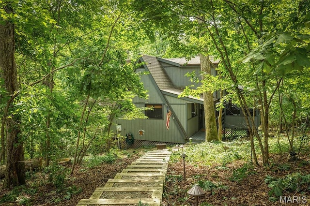 1235 Powderhorn Dr, Innsbrook, MO 63390 - view of side of home featuring stairway
