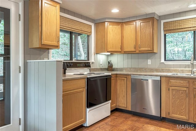 1235 Powderhorn Dr, Innsbrook, MO 63390 - kitchen featuring electric stove, stainless steel dishwasher, a sink, light countertops, and recessed lighting