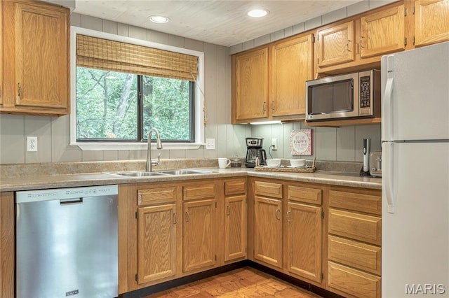 1235 Powderhorn Dr, Innsbrook, MO 63390 - kitchen with appliances with stainless steel finishes, a sink, light countertops, and recessed lighting