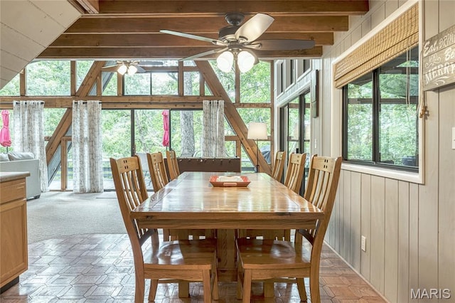 1235 Powderhorn Dr, Innsbrook, MO 63390 - dining room featuring ceiling fan and wooden walls