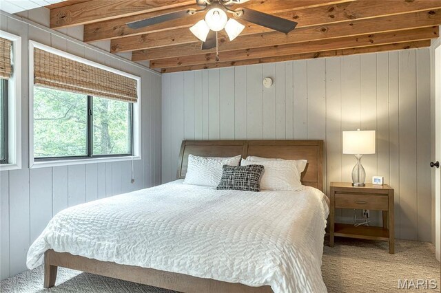 1235 Powderhorn Dr, Innsbrook, MO 63390 - carpeted bedroom featuring wood walls and ceiling fan