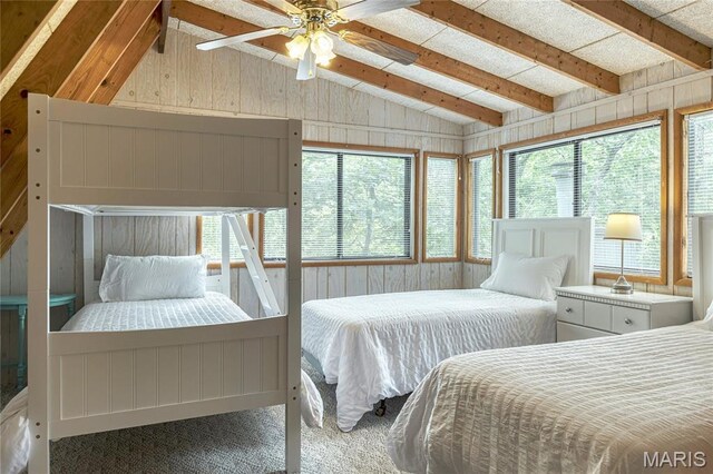 1235 Powderhorn Dr, Innsbrook, MO 63390 - bedroom with wooden walls, carpet floors, and ceiling fan