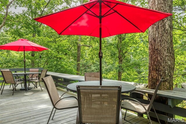 1235 Powderhorn Dr, Innsbrook, MO 63390 - wooden deck with outdoor dining area
