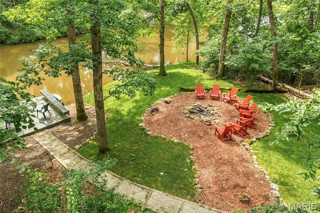 1235 Powderhorn Dr, Innsbrook, MO 63390 - view of green lawn with an outdoor fire pit