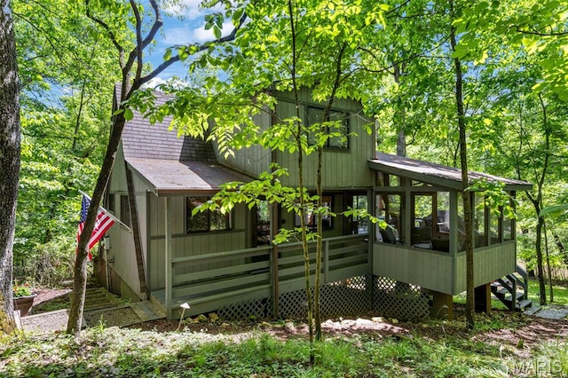 1235 Powderhorn Dr, Innsbrook, MO 63390 - back of property with a sunroom