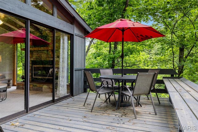 1235 Powderhorn Dr, Innsbrook, MO 63390 - wooden deck with outdoor dining space