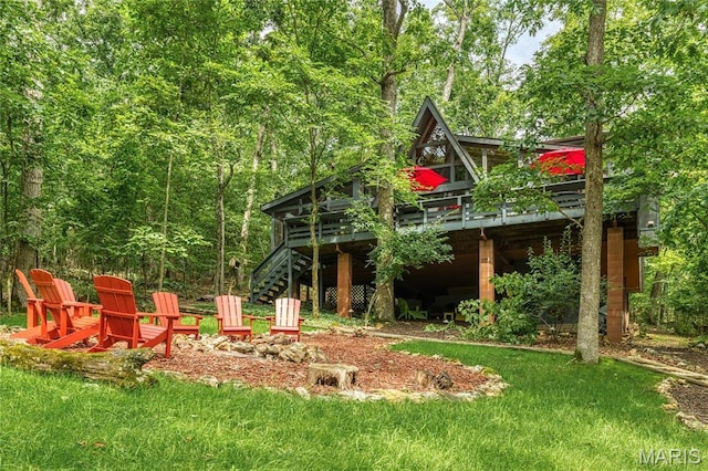 1235 Powderhorn Dr, Innsbrook, MO 63390 - back of house featuring stairway, a deck, and a yard