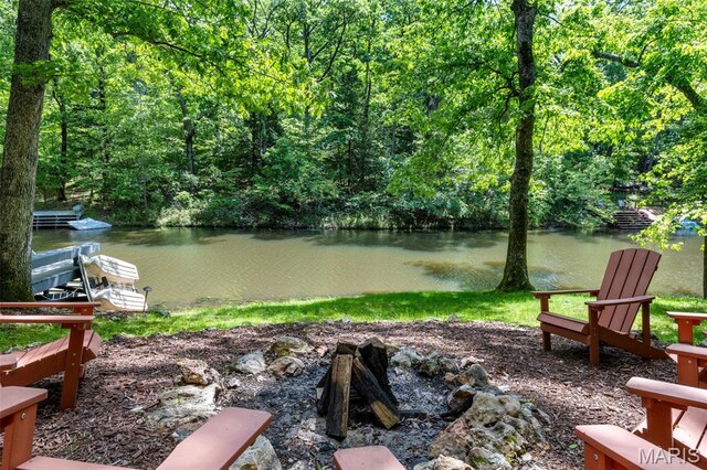 1235 Powderhorn Dr, Innsbrook, MO 63390 - view of yard featuring a wooded view and a water view