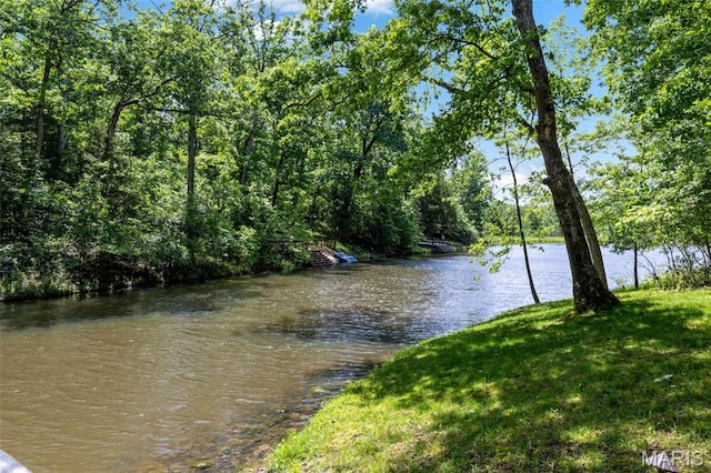 1235 Powderhorn Dr, Innsbrook, MO 63390 - water view with a heavily wooded area