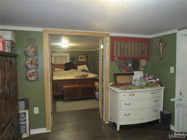 2375 Argo Rd, Cuba, MO 65453 - bedroom featuring dark wood-style flooring, baseboards, and crown molding