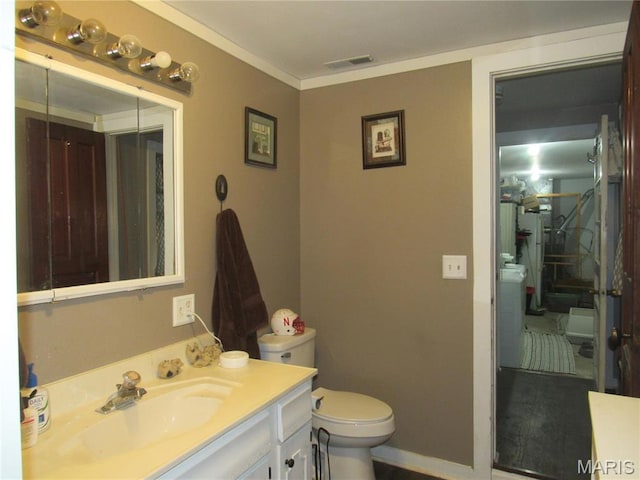2375 Argo Rd, Cuba, MO 65453 - bathroom featuring toilet, vanity, and crown molding